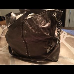 bag looks more Silver / Gray / Silver accents